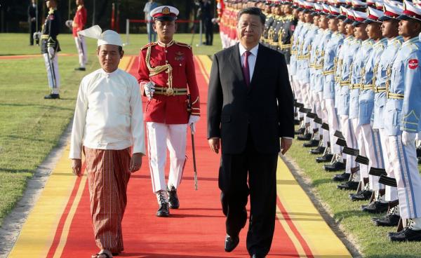 President Xi Jinping of China and his counterpart in Myanmar, Win Myint, during a welcome ceremony at the Presidential Palace in Naypyidaw, Myanmar, on Friday.Credit…Ann Wang/Reuters