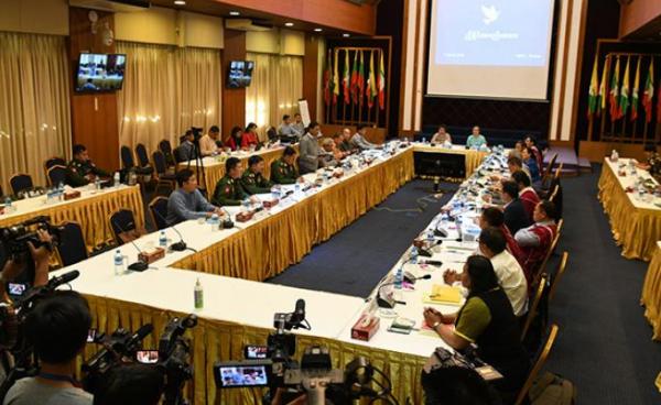 Government representatives and the representatives of (NCA-S EAO) hold the bilateral coordination meeting at National Reconciliation and Peace Centre in Yangon yesterday. Photo: MNA