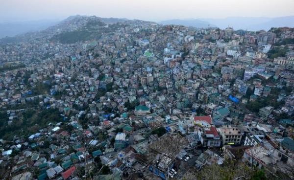 A bird's eye view at dusk, of Aizawl city, the capital of Mizoram India. Photo: EPA