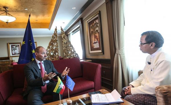 EU Ambassador Roland Kobia, left, discusses the EU-Myanmar programme with Mizzima Editor in Chief Soe Myint, right. Photo: Hong Sar/Mizzima