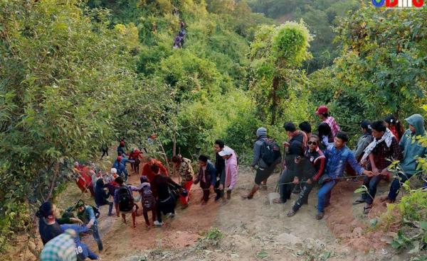 Visitors climb Bay Ngar Rar Mountain in 2021.