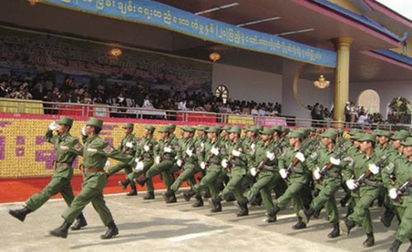 Photo by SHAN- the United Wa State Army (UWSA) soldiers march on the 20th anniversary in the Headquarters Pangsang in 2009.