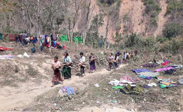  Chin villagers fleeing from the Burma Army jet attacks. Photo-FBR 