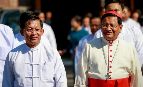 Commander-in-Chief of the Myanmar Armed Forces, General Min Aung Hlaing (L), walks next to Cardinal Charles Maung Bo (R) as he leaves after visiting St. Mary's Cathedral on Christmas Day in Yangon, Myanmar, 25 December 2019. Photo: Lynn Bo Bo/EPA