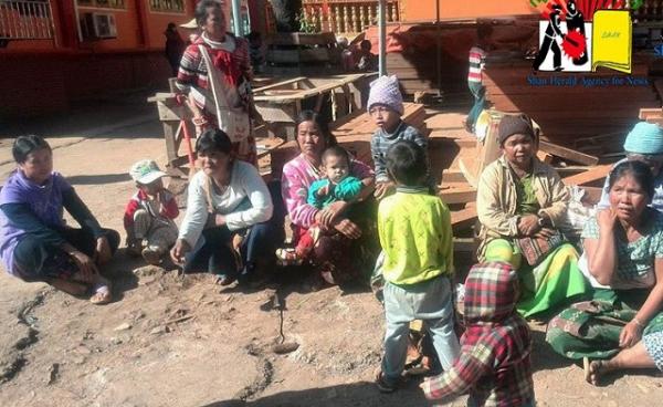 Photo SHAN- Women and children pictured at Marnsu monastery in Lashio Township on December 10 due to clashes between TNLA and Burma Army.