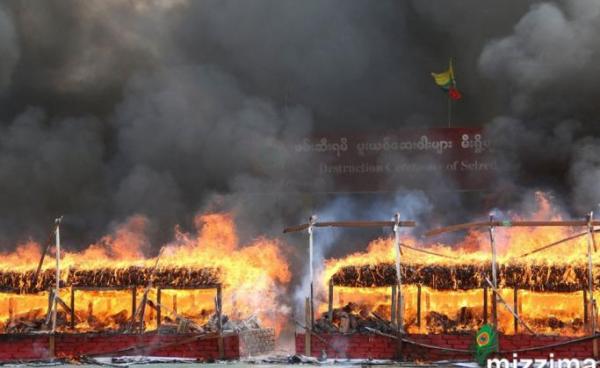 A pile of illegal drugs burn during a 'Destruction Ceremony of Seized Narcotic Drugs', held to mark the International Day against Drug Abuse, in Yangon on 26 June, 2019. Photo: Thet Ko/Mizzima