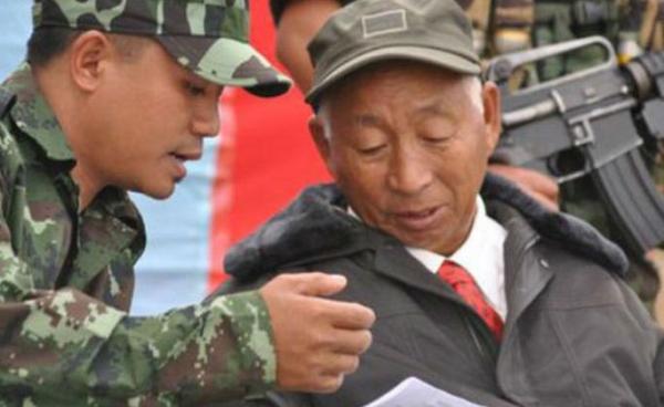 in this file photo Yung Aung (left) is seen with SS Khaplang  