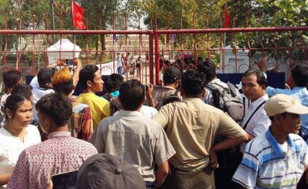 File photo: Relatives await released prisoners at prison's front gate