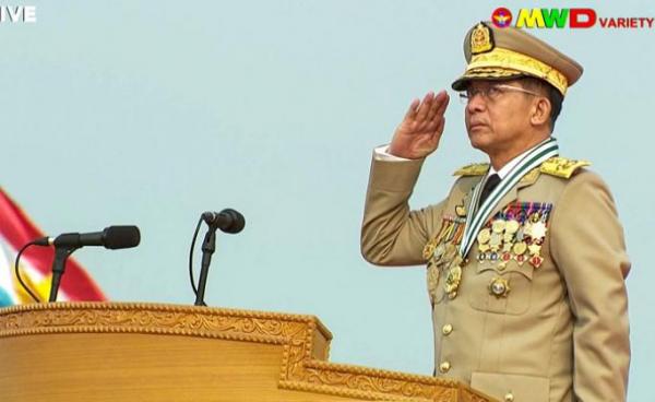 In this file screengrab provided via AFPTV and taken from a broadcast by Myawaddy TV in Myanmar on March 27, 2021, Myanmar armed forces chief Senior General Min Aung Hlaing salutes during an annual parade put on by the military to mark Armed Forces Day in the capital Naypyidaw. Photo: AFP