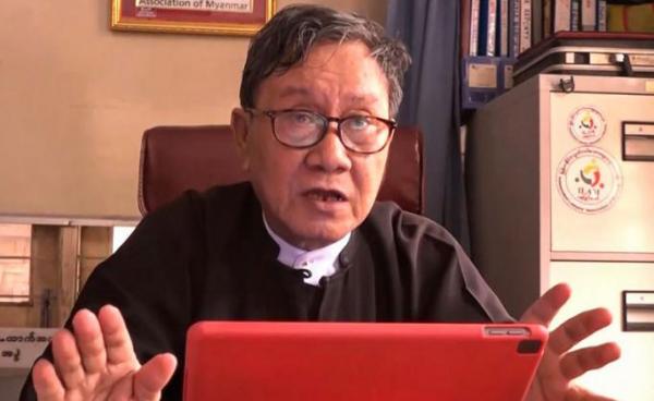  This screengrab provided via AFPTV video footage taken on May 10, 2021 shows Khin Maung Zaw, lawyer for detained civilian leader Aung San Suu Kyi who has not been seen since the February 1 military coup, being interviewed in an office in Naypyidaw. AFPTV / AFP