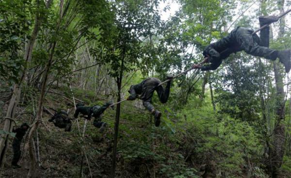 This undated photo taken in May 2021 shows anti-coup activists undergo basic military training at the camp of Karen National Union (KNU), an ethnic rebel group in Karen State after people fled major Myanmar cities due to military crackdown and sought refuge in rebel territories. Photo: AFP