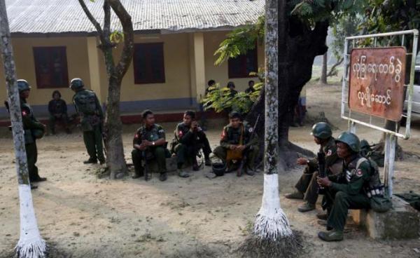 Myanmar soldiers relax inside the Kyee Ken Pyin police border guard post near Maungdaw town of Bangladesh-Myanmar border, Rakhine State. Photo: Nyein Chan Naing/EPA