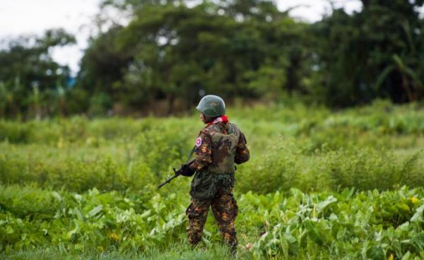 A Myanmar soldier guards an area at Sittwe airport in Rakhine State on September 20, 2018. Photo: AFP