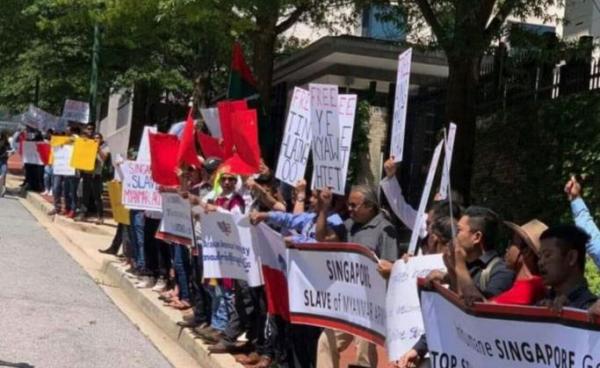 A group of Myanmar nationals staged a protest in front of the Singapore Embassy in Washington DC on July 15. Photo: Voice Of Arakan/Twitter