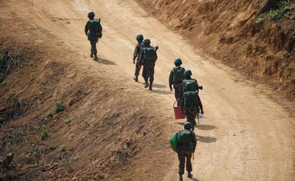 (File) Soldiers walk near the command center during the first day of 'Sin Phyu Shin' joint military exercises in Ayeyarwaddy delta region, Myanmar. Photo: EPA