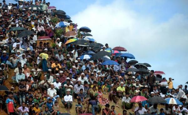 Rohingya refugees attend a ceremony organised to remember the second anniversary of a military crackdown that prompted a massive exodus of people from Myanmar to Bangladesh, at the Kutupalong refugee camp in Ukhia on August 25, 2019. Photo: Munir Uz Zaman/AFP