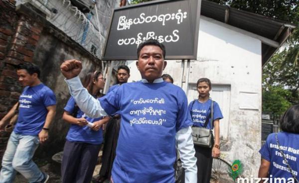 Myat Kyaw who is one of 17 accused in ‘Stop War’ campaign case is seen in front of Bahan court on May 24. Photo: Thura/Mizzima