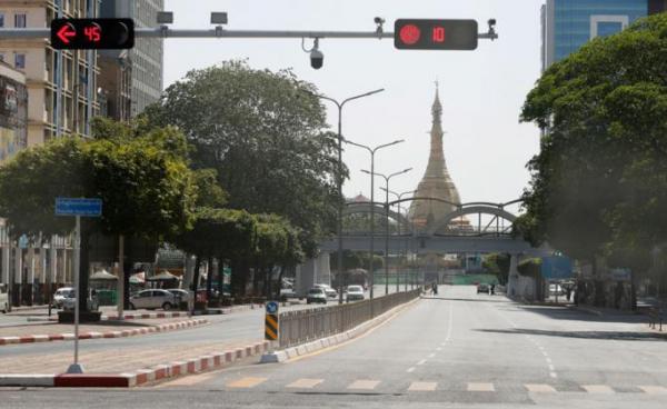 Nearly empty is the Sule pagoda road in downtown Yangon, Myanmar, 01 February 2022. Photo: EPA