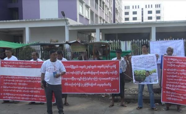 Protesters in demonstration and leader Myint Aung in this protest. Photo: Chan Nyein/Mizzima