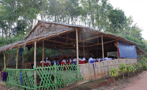 Currently, the students are studying in bamboo huts