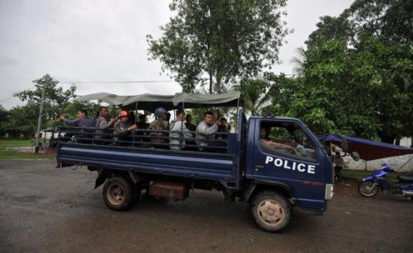 Policemen patrol in a truck the streets of Sittwe, capital of Myanmar's western state of Rakhine. Photo: AFP 