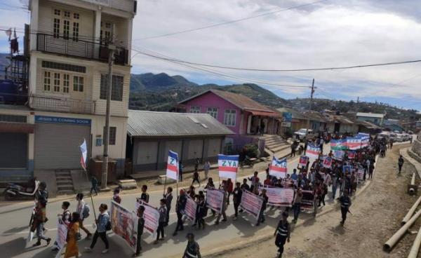 Protestors take to the streets of Tonzang township in Chin State following recent murder of a female teacher. Photo: Chin World