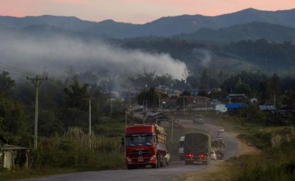 Trucks travelling along a road near Muse in Myanmar's Shan state, near the border to China. Photo: Ye Aung Thu/AFP