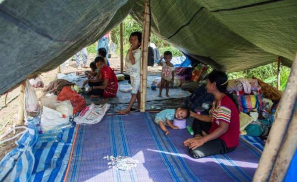 Myanmar refugees and their children, who fled a surge in violence as the military cracks down on rebel groups, at a camp in Nawphewlawl near the Myanmar-Thailand border in Kayin state. Photo: AFP