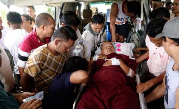 An injured monk is brought to the Sittwe Hospital in Sittwe, Rakhine State, Myanmar, 01 October 2019. Five people were reportedly injured after Myanmar security forces opened fire in the village of Mein Wa near Kyauk Taw township. According to local media reports, approximately 50,000 people have fled to temporary camps in recent weeks as fighting continues in the restive Rakhine state. Photo: Nyunt Win/EPA