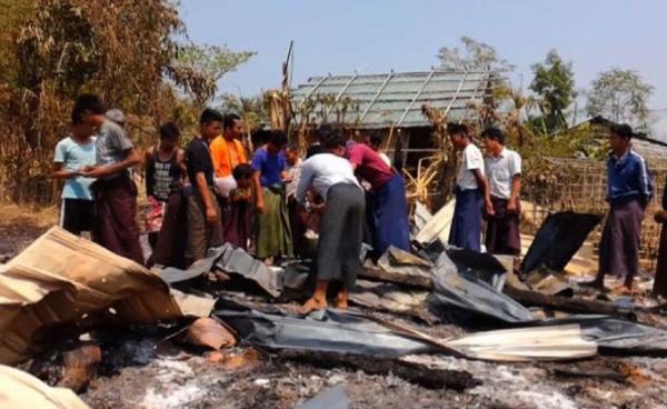 Locals survey the damage after fighting between Myanmar's military and ethnic Rakhine insurgents near the town of Mrauk U, former capital of the Rakhine kingdom. Photo: AFP