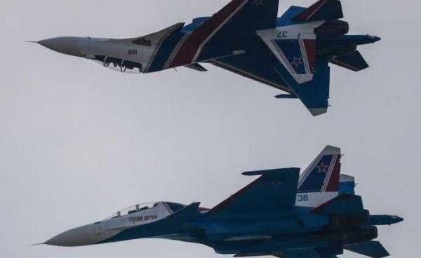 (File) 'The Russian Knights' an aerobatic demonstration team of the Russian Air Force, flying the Sukhoi Su-30SM fighter aircraft, perform during the Moscow International Aviation and Space Salon MAKS-2017 in the city of Zhukovsky, outside Moscow, 22 July 2017. Photo: Sergei Ilnitsky/EPA