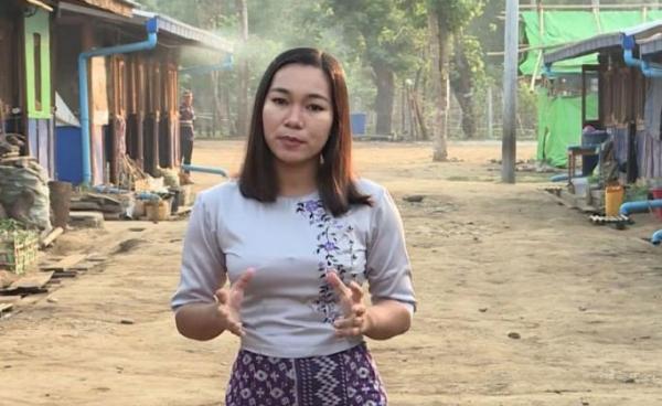 Htet Htet Khine is seen filming in an IDP camp in Kachin State. Photo BBC Media Action